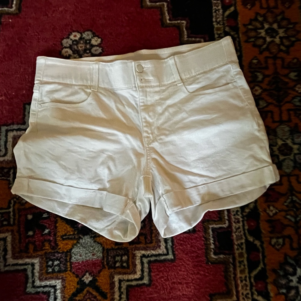 White elastic waist size 14 Apt 9 shorts with cuffs.